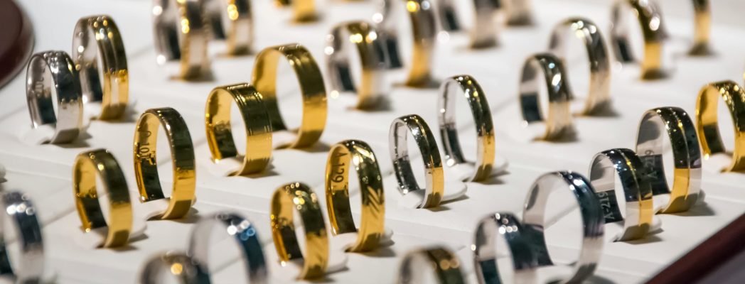 A luxurious display of gold and silver rings, perfect for showcasing jewelry collections.